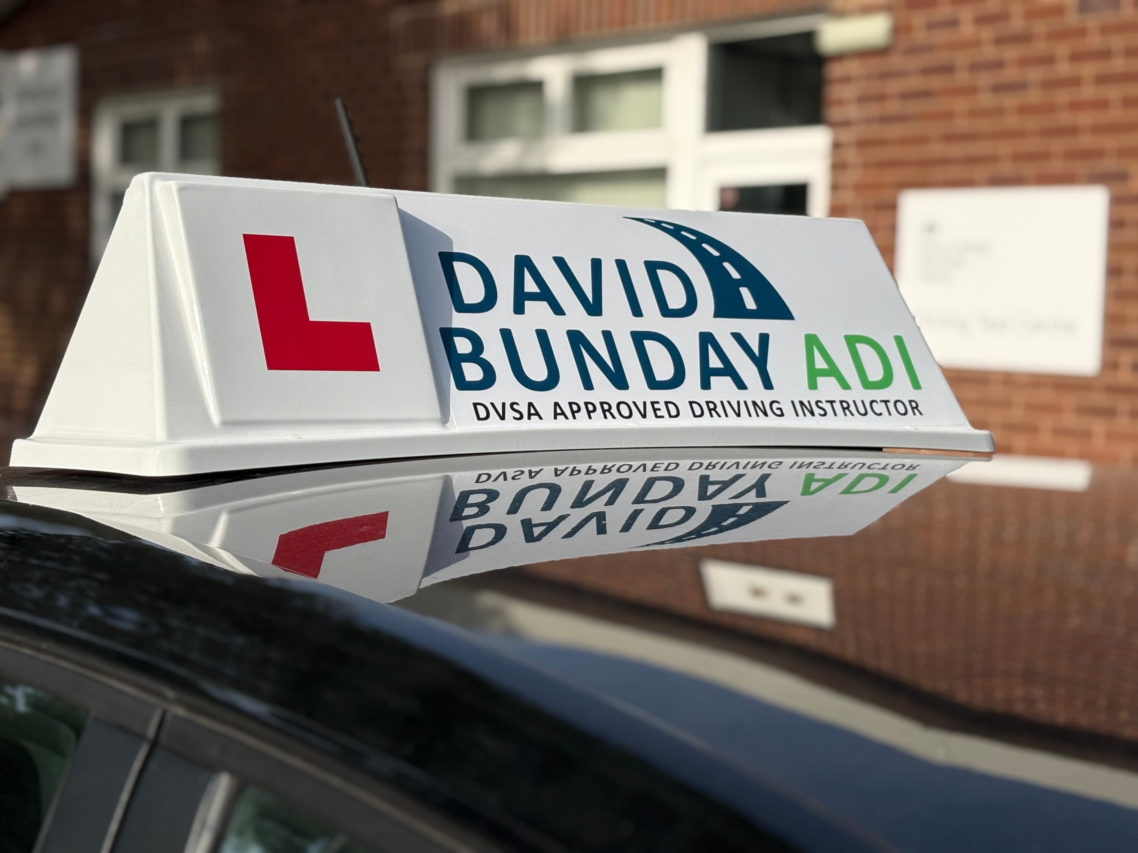 David Bunday ADI — driving instructor roof sign